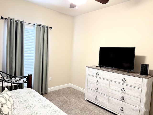 7091 Rocky Road Loop, Gulf Shores, AL 36542 - carpeted bedroom with baseboards and a ceiling fan