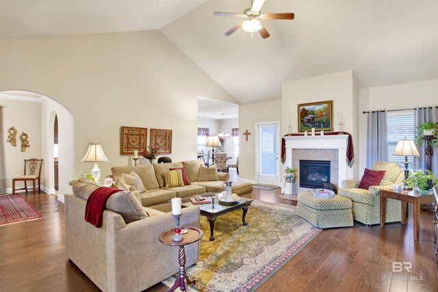 7091 Rocky Road Loop, Gulf Shores, AL 36542 - living room featuring arched walkways, dark wood-style flooring, ceiling fan, and high vaulted ceiling