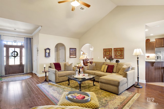 7091 Rocky Road Loop, Gulf Shores, AL 36542 - living room with visible vents, ceiling fan, dark wood-style flooring, arched walkways, and baseboards