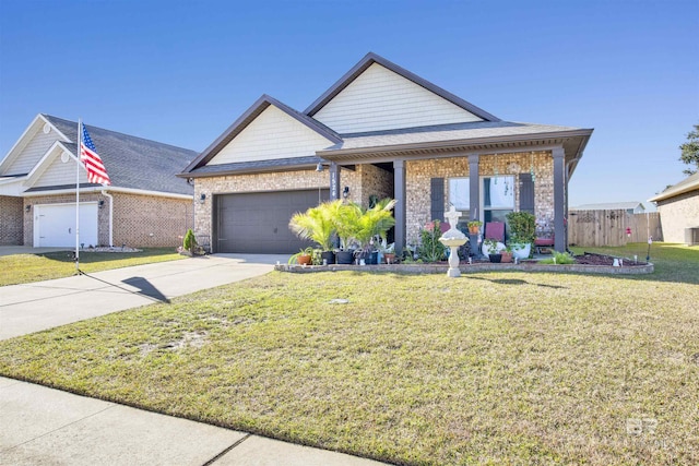 view of front of property featuring a garage and a front lawn