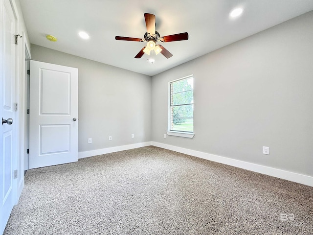 spare room featuring a ceiling fan, baseboards, recessed lighting, and carpet floors