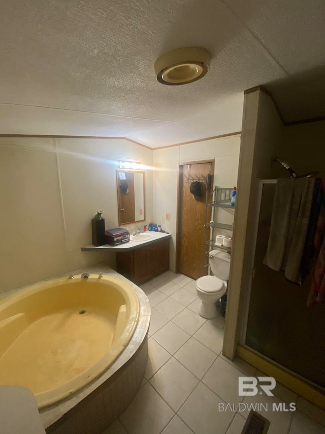 bathroom featuring tile patterned flooring, toilet, sink, a shower with door, and a textured ceiling