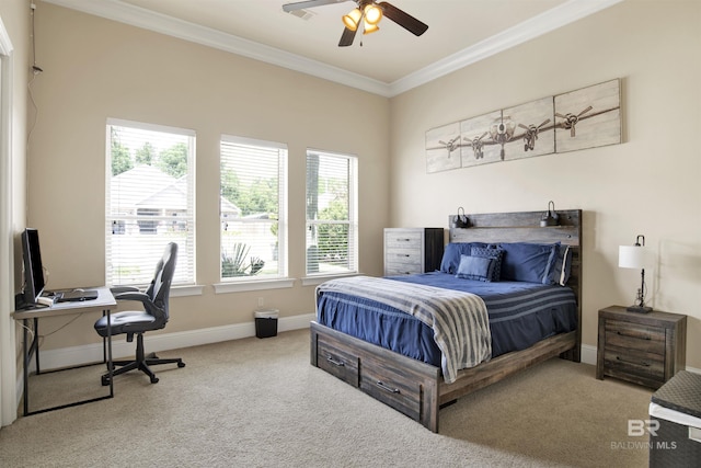 bedroom with baseboards, ornamental molding, carpet, and ceiling fan