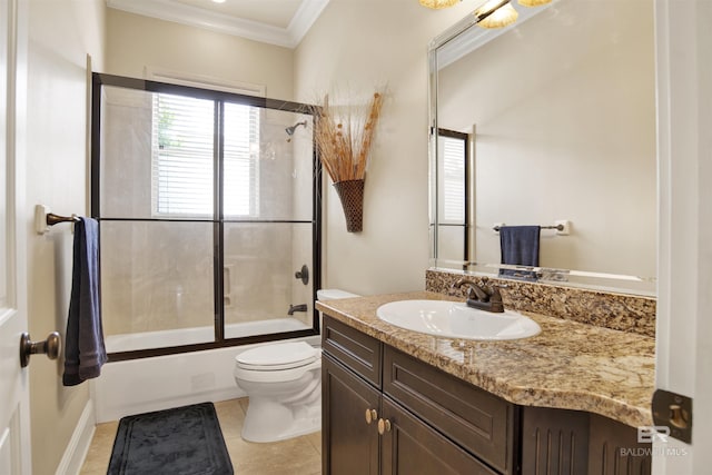 full bathroom featuring vanity, ornamental molding, tile patterned flooring, toilet, and shower / washtub combination