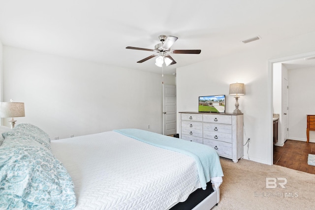 bedroom with hardwood / wood-style flooring and ceiling fan