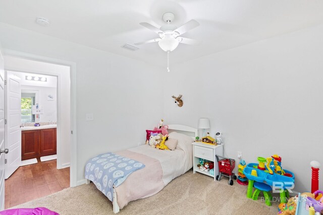 bedroom featuring light hardwood / wood-style floors and ceiling fan