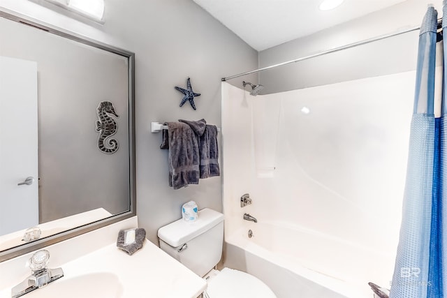 full bathroom featuring shower / bath combination with curtain, toilet, and sink