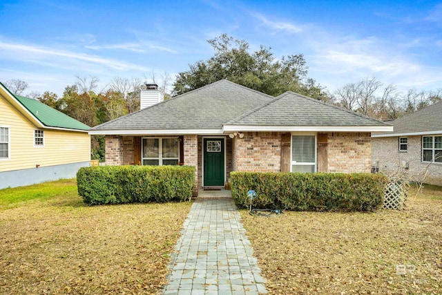 view of front of house featuring a front yard