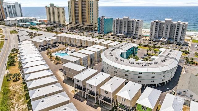 drone / aerial view with a water view and a city view