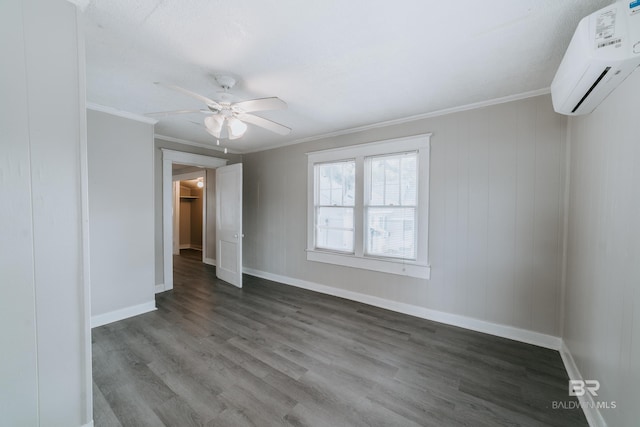 unfurnished room with ceiling fan, a wall mounted AC, crown molding, and hardwood / wood-style flooring