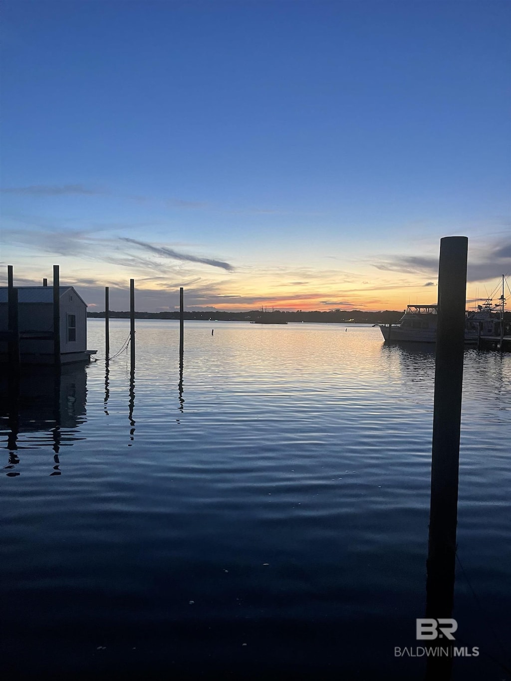 14100 River Rd Unit 122, Perdido Key, FL 32507 - dock area with a water view