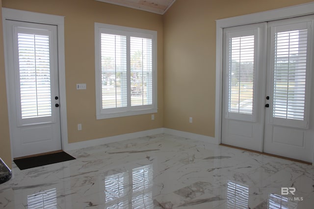 doorway featuring plenty of natural light and french doors