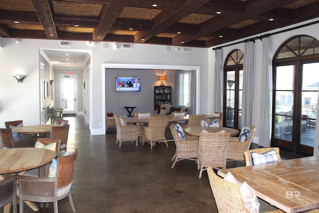 dining area with french doors, beamed ceiling, a healthy amount of sunlight, and coffered ceiling