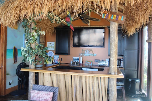 interior space featuring ceiling fan
