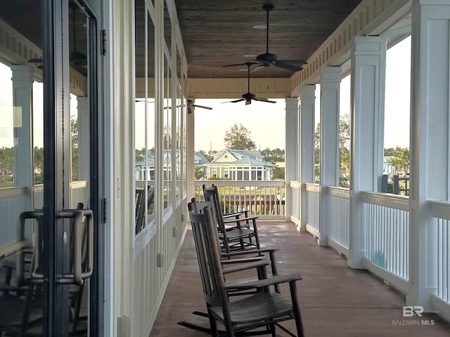 balcony featuring ceiling fan and covered porch