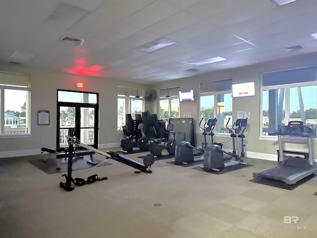 workout area with carpet and french doors