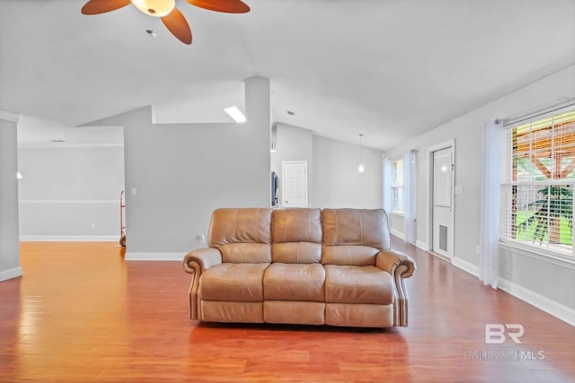 27913 Turkey Branch Dr, Daphne, AL 36526 - living room featuring lofted ceiling, a ceiling fan, and wood finished floors