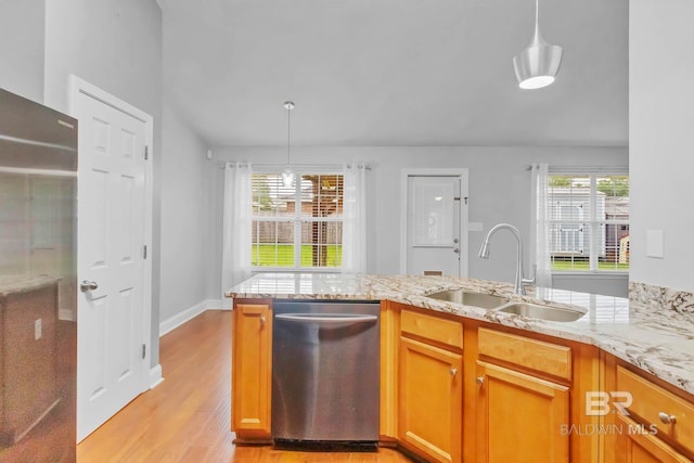 27913 Turkey Branch Dr, Daphne, AL 36526 - kitchen featuring stainless steel dishwasher, light wood-style flooring, light stone counters, and pendant lighting