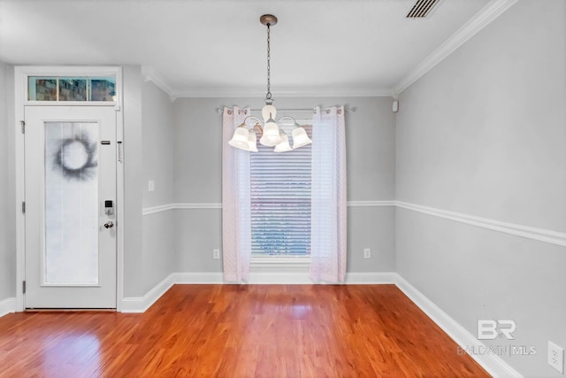 27913 Turkey Branch Dr, Daphne, AL 36526 - foyer with a chandelier, wood finished floors, and ornamental molding
