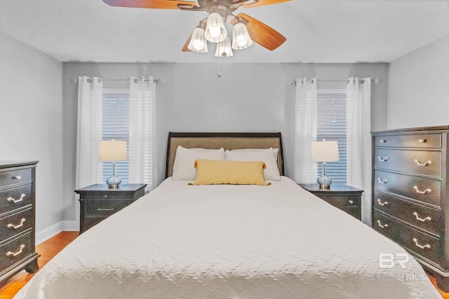 27913 Turkey Branch Dr, Daphne, AL 36526 - bedroom featuring wood finished floors and a ceiling fan
