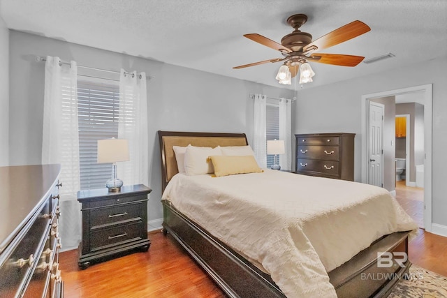 27913 Turkey Branch Dr, Daphne, AL 36526 - bedroom with wood finished floors and a ceiling fan