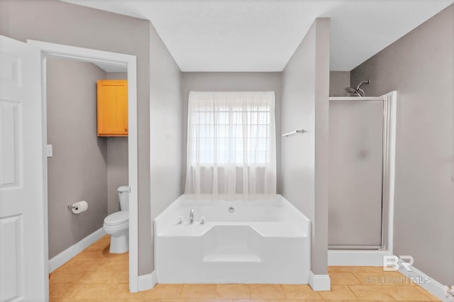 27913 Turkey Branch Dr, Daphne, AL 36526 - bathroom featuring a stall shower, a garden tub, and tile patterned floors