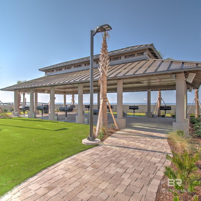 view of community with a yard and a gazebo