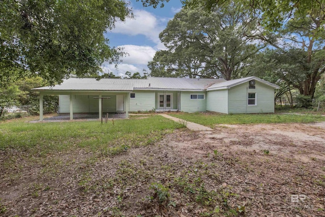 back of property with metal roof