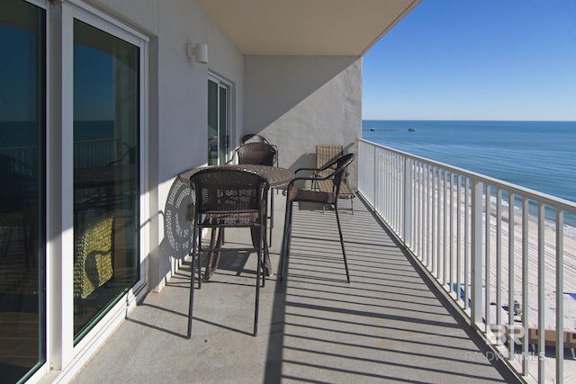 balcony featuring a water view