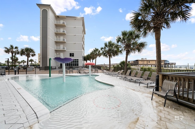 view of swimming pool with a patio