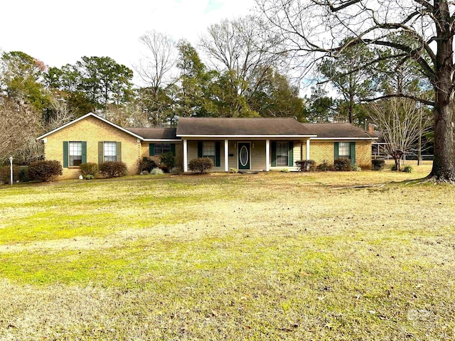 ranch-style house featuring a front lawn