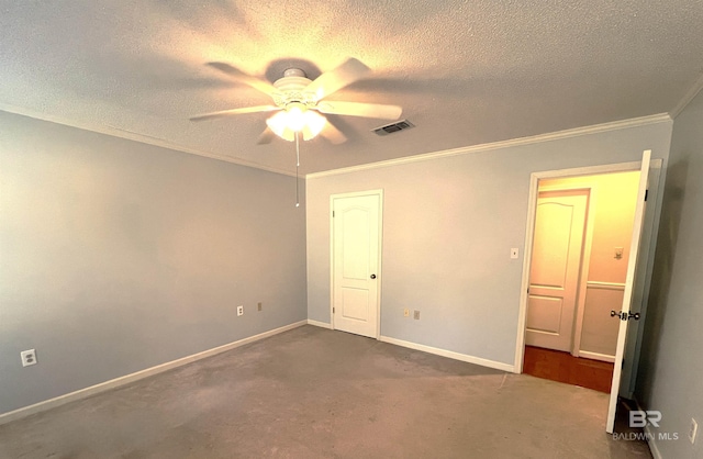 unfurnished bedroom featuring a textured ceiling, ceiling fan, carpet, and crown molding