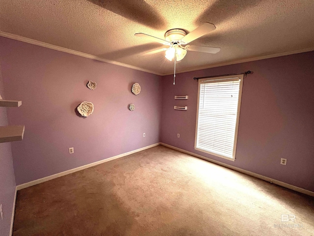 unfurnished room featuring ceiling fan, crown molding, carpet flooring, and a textured ceiling