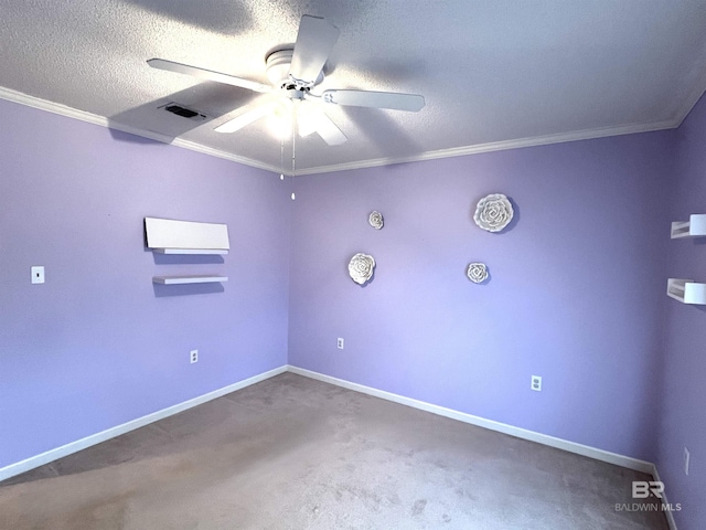 carpeted spare room with a textured ceiling, ceiling fan, and crown molding