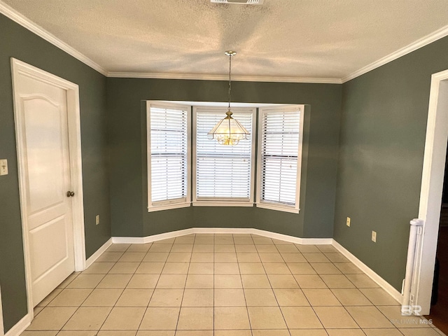 unfurnished dining area with a textured ceiling, a chandelier, light tile patterned floors, and crown molding