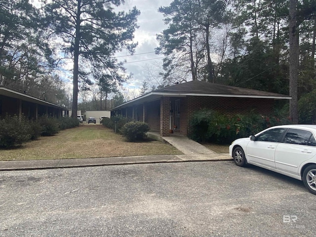 view of front of home with a front lawn