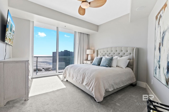 bedroom with ceiling fan and carpet