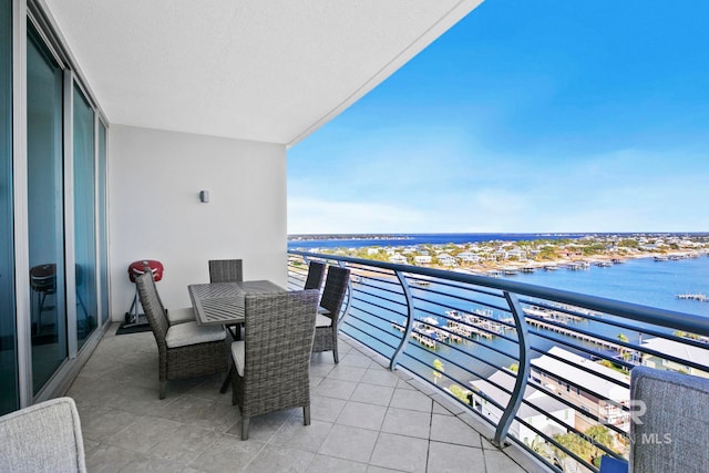 balcony featuring a water view