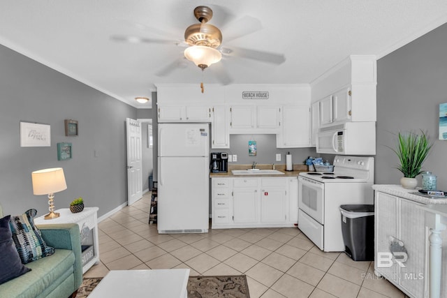 1118 W Beach Blvd Unit 4, Gulf Shores, AL 36542 - kitchen featuring white appliances, a sink, a ceiling fan, light countertops, and white cabinetry