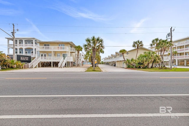1118 W Beach Blvd Unit 4, Gulf Shores, AL 36542 - view of front facade featuring stairway