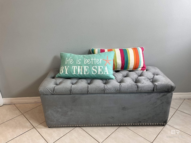 1118 W Beach Blvd Unit 4, Gulf Shores, AL 36542 - living room featuring tile patterned flooring and baseboards
