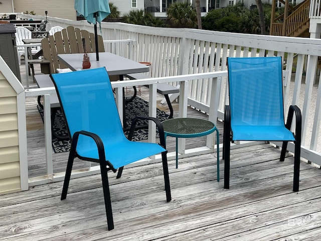 1118 W Beach Blvd Unit 4, Gulf Shores, AL 36542 - deck featuring outdoor dining area