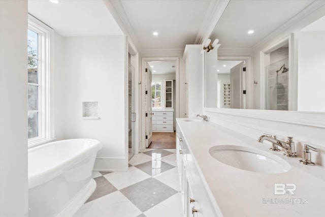 bathroom with vanity, separate shower and tub, and crown molding