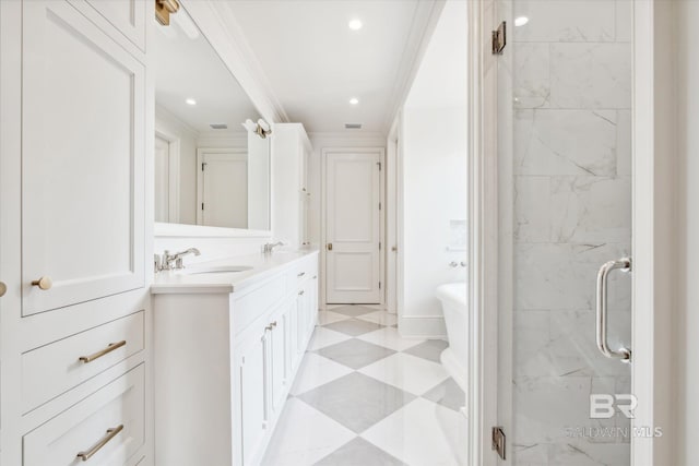 bathroom featuring vanity, crown molding, and walk in shower