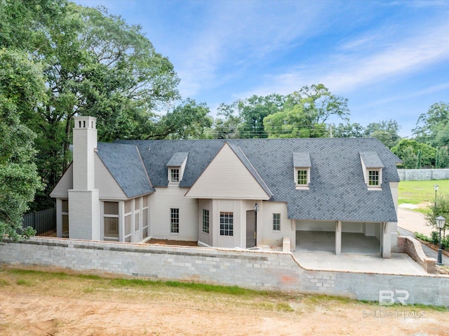 view of front of home with a patio area