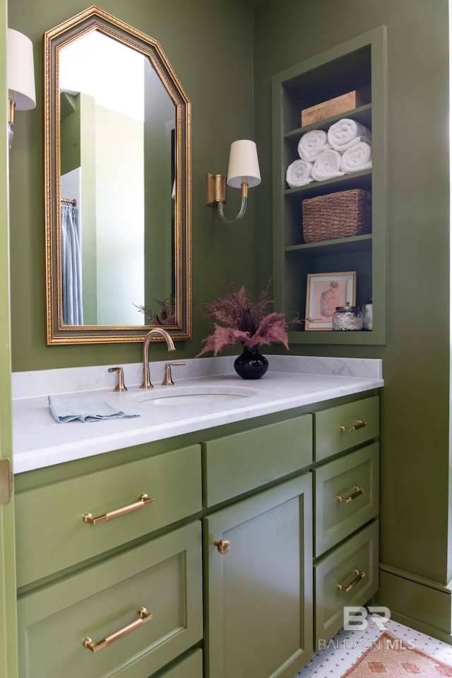 bathroom featuring vanity and built in features