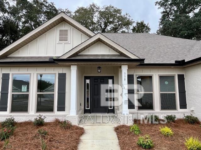 view of front of home featuring covered porch