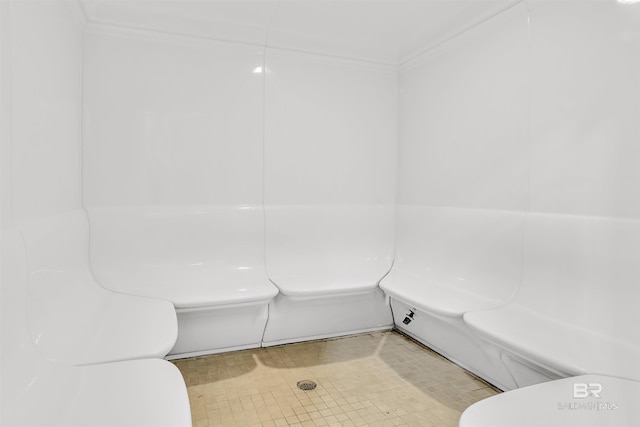 bathroom featuring ornamental molding