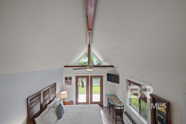 interior space featuring french doors, access to exterior, wood finished floors, and lofted ceiling with beams
