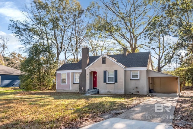 view of front facade with a chimney, crawl space, a carport, driveway, and a front lawn